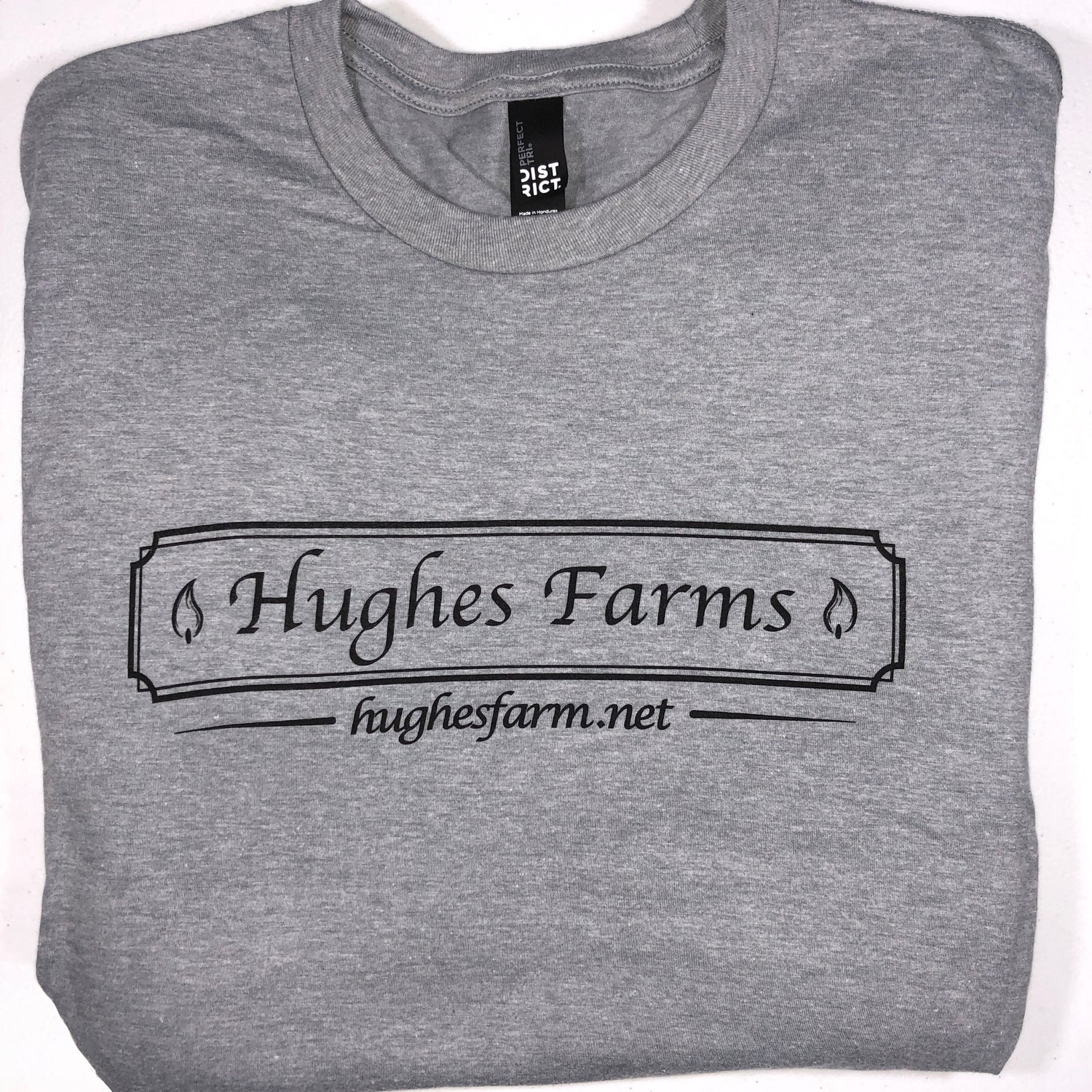 A pair of hughesfarms shirts